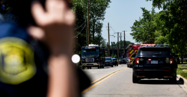 Police and emergency response vehicles line the street at the scene of a shooting at CrossPointe Community Church on June 22, 2025 in Wayne, Michigan (Emily Elconin/Getty Images)