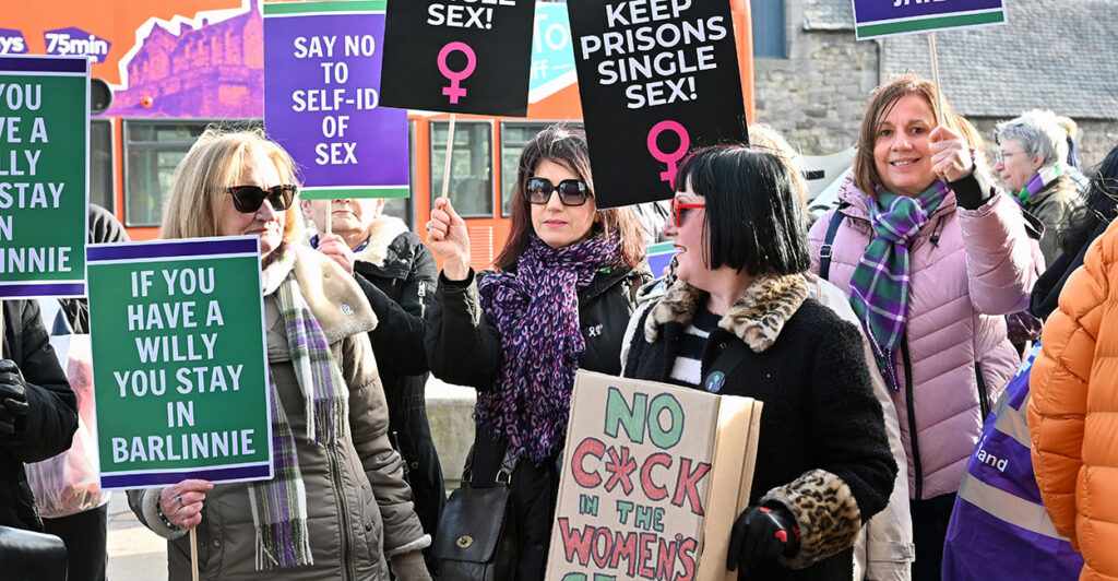Women protest men in women's prisons