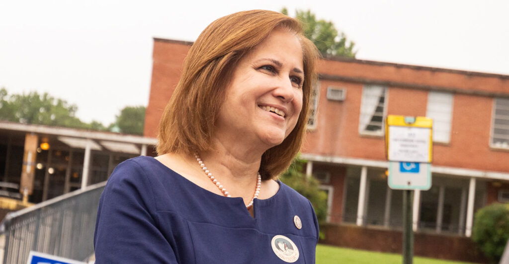 Virginia State Sen. and Democratic nominee for lieutenant governor Ghazala Hashmi in a blue dress outside of a polling place