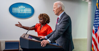 former Biden press secretary Karin Jean-Pierre and former President Joe Biden, at the press podium in the White House