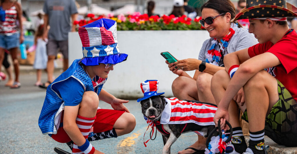 Dogs and kids alike are festooned in red, white, and blue at the 17th annual Fourth of July Pet Parade in Salisbury, Massachusetts, on July 4, 2024.