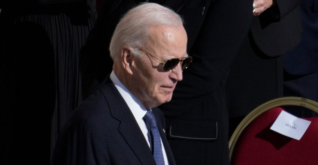 Joe Biden walks with sunglasses on at the Pope's funeral at the Vatican in Rome.