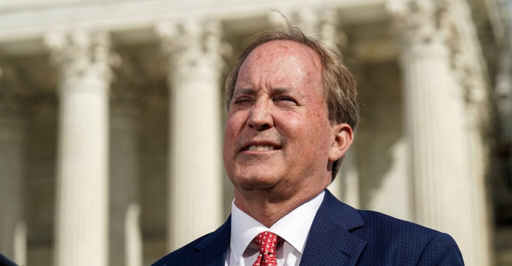 Close-up of Texas Attorney General Ken Paxton standing in front of the Supreme Court.
