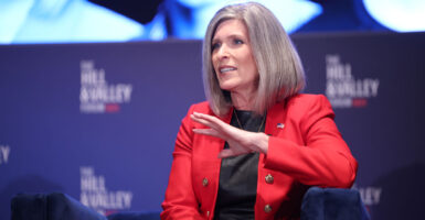 Sen. Joni Ernst, R-Iowa, wearing a red blazer