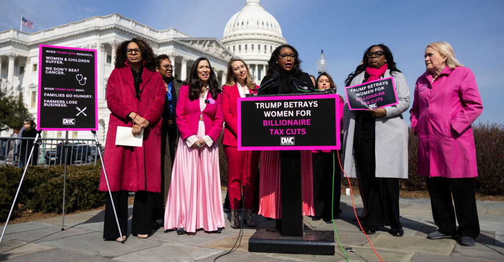 Rep. Emilia Skyes speaks at a news conference outside the U.S. Capitol with several other members of Democratic Women's Conference.