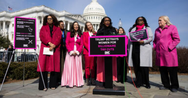 Rep. Emilia Skyes speaks at a news conference outside the U.S. Capitol with several other members of Democratic Women's Conference.