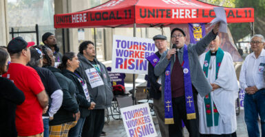 A group of airport and hotel workers stage a hunger strike outside of Los Angeles City Hall on Monday, December 9, 2024.