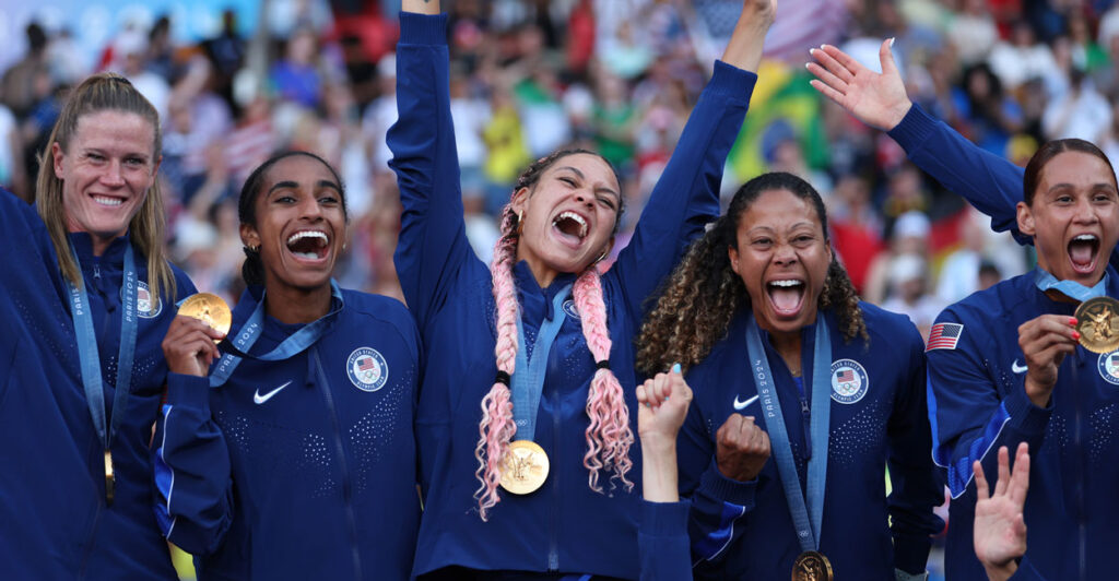 Soccer Olympic gold medalist Trinity Rodman (center) of Team United States and her teammates celebrate last Aug. 10 in Paris.