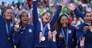Soccer Olympic gold medalist Trinity Rodman (center) of Team United States and her teammates celebrate last Aug. 10 in Paris.