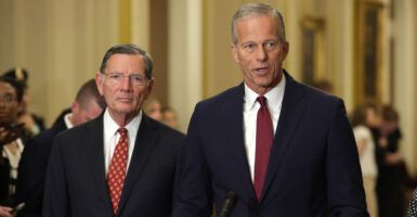 Senate Majority Leader John Thune, R-S.D., left, speaks as Senate Majority Whip Sen. John Barrasso, R-Wy., listens during a news briefing after the weekly Senate Republican policy luncheon at the U.S. Capitol on July 22, 2025 in Washington, DC.