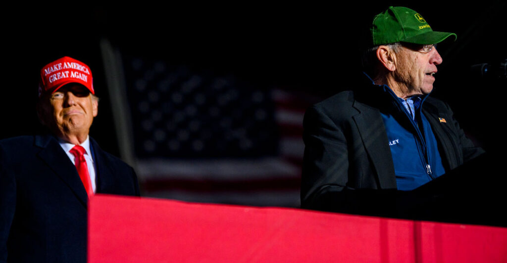 Sen. Chuck Grassley, R-Iowa (right), is joined by Donald Trump at a campaign event on Nov. 3, 2022, in Sioux City, Iowa.