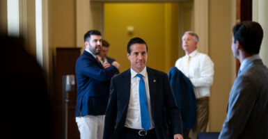 Sen. Bernie Moreno walks through halls of Congress.