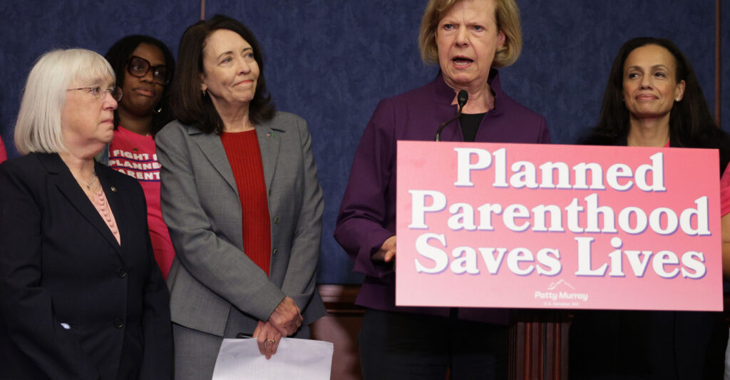 U.S. Sen. Tammy Baldwin (D-WI) speaks as (L-R) Sen. Patty Murray (D-WA), Sen. Maria Cantwell (D-WA) and President of Planned Parenthood Alexis McGill Johnson listen during a news conference on the budget reconciliation bill at the U.S. Capitol on May 14, 2025 in Washington, DC.