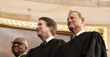 U.S. Associate Supreme Court Justices Clarence Thomas and Brett Kavanaugh and U.S. Supreme Court Chief Justice John Roberts react during inauguration ceremonies in the Rotunda of the U.S. Capitol on January 20, 2025 in Washington, DC. Donald Trump takes office for his second term as the 47th president of the United States.