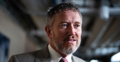 Rep. Thomas Massie, R-Ky., speaks to reporters in the basement of the Capitol.