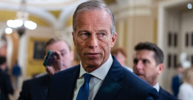 A grim-faced Senate Majority Leader John Thune, R-S.D.