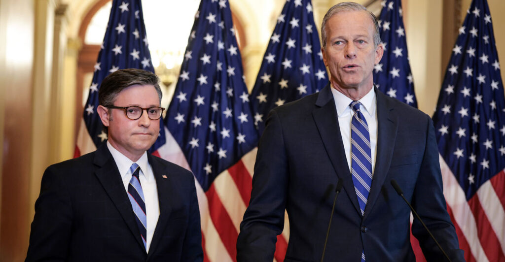 Mike Johnson and John Thune stand at a lectern at the Capitol.