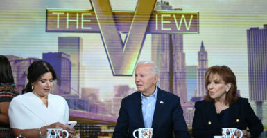 Anna Navarro of ABC-TV's "The View" (left)—seen here with then-President Joe Biden and fellow "View" co-host Joy Behar on Sept. 25.