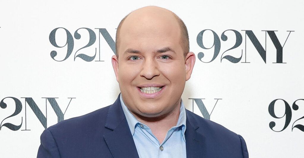 CNN's Brian Stelter, seen here on Nov. 14, 2023, in New York City with a backdrop that says "92NY"