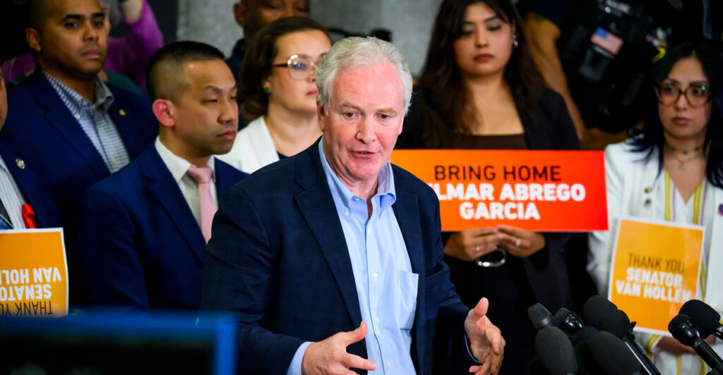 Sen. Chris Van Hollen, D-Md., fields questions at a press conference at Washington Dulles International Airport after returning from El Salvador, where he met with Kilmar Abrego Garcia, on April 18.