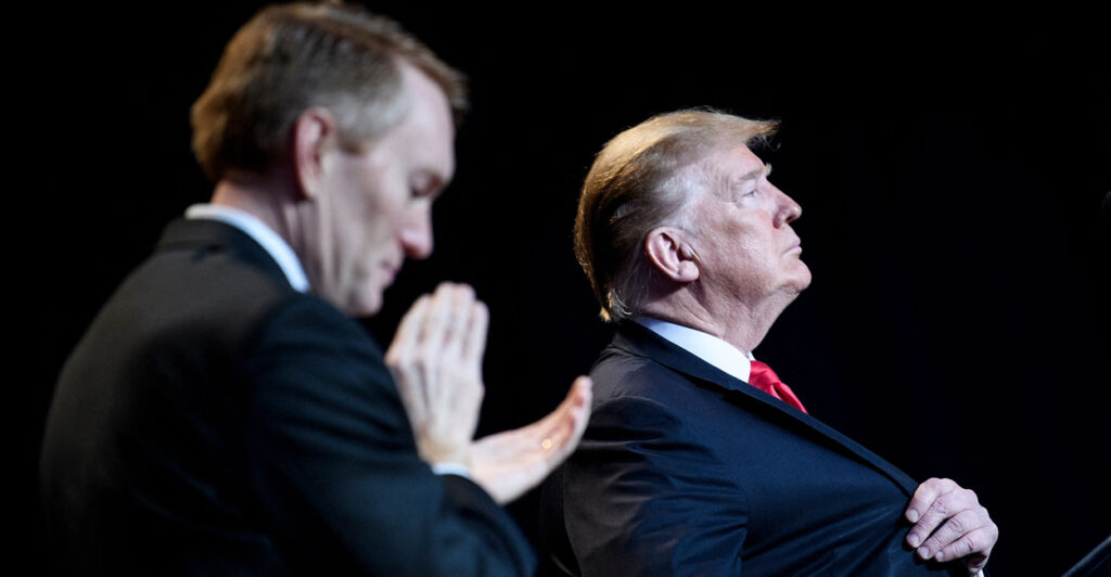 Sen. James Lankford, R-Okla., applauds President Donald Trump at the National Prayer Breakfast on Feb. 7, 2019, in Washington.