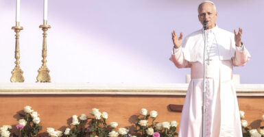 Pope Leo XIV arrives to lead the closing Mass of the Jubilee of Youth on Sunday in Rome.