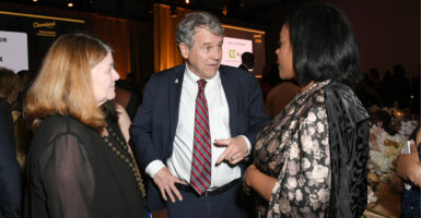 Former Sen. Sherrod Brown, D-Ohio, chats at an event.