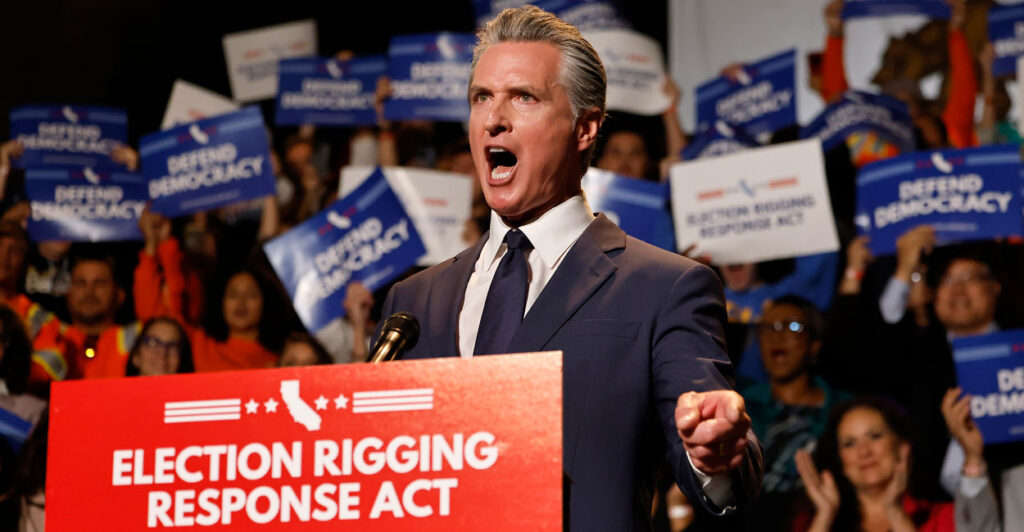 Gavin Newsom yells while standing behind podium reading "Election Rigging Response Act."