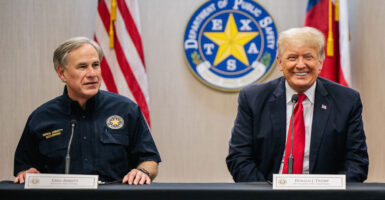 Texas Gov. Greg Abbott addresses former President Donald Trump during a border security briefing on June 30, 2021 in Weslaco, Texas.
