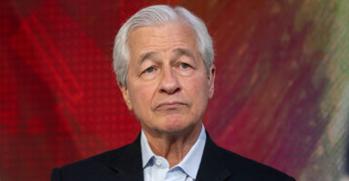 JPMorgan Chase CEO Jamie Dimon against a red background.