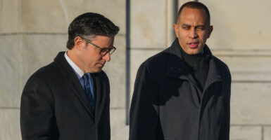 Speaker Mike Johnson and House Minority Leader Hakeem Jeffries, D-N.Y., walk together outside of the U.S. Capitol on January 9, 2025 in Washington, DC.