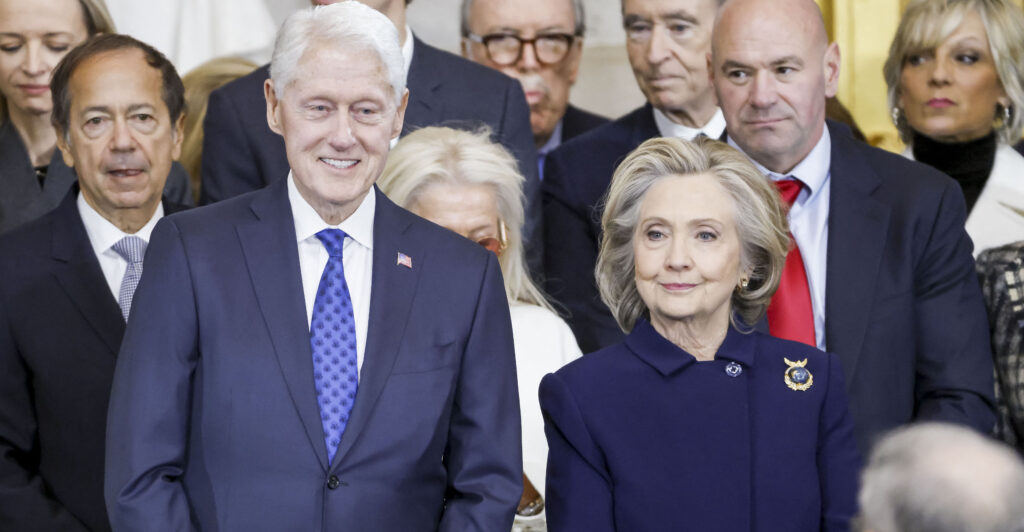 Bill and Hillary Clinton stand together at the inauguration of President Donald Trump.