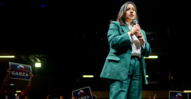 Candidate for Texas Attorney General Rochelle Garza speaks at a "Get Out The Vote" rally on October 18, 2022.