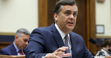 Jonathan Turley looks straight into the camera.