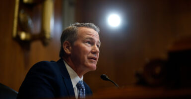Sen. Jon Husted, R-Ohio, speaks into the microphone during a Senate panel's April 2 hearing.