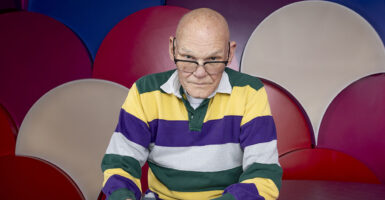 James Carville in a rainbow shirt