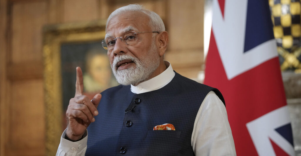Prime Minister Narendra Modi of India gestures during a press conference with Britain's Prime Minister Keir Starmer