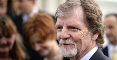Jack Phillips talks with journalists in front of the Supreme Court after the court heard the case Masterpiece Cakeshop v. Colorado Civil Rights Commission December 5, 2017 in Washington, DC.
