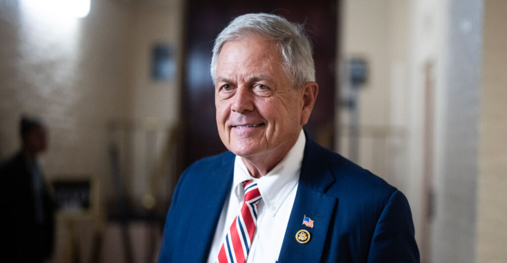 Rep. Ralph Norman, R-S.C., walks down a hallway in the Capitol.