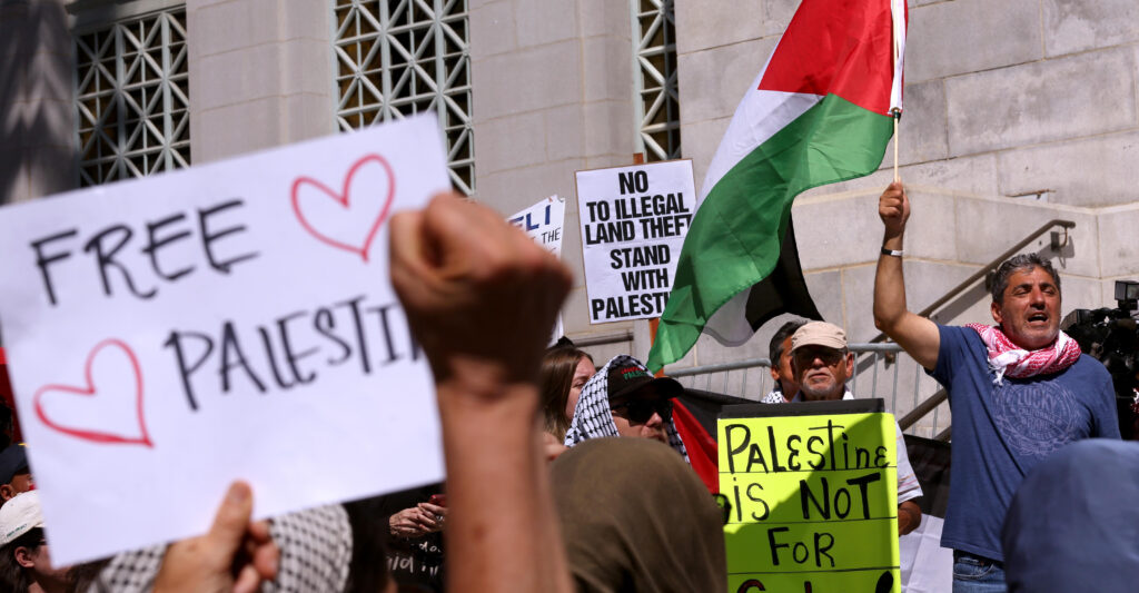 The Palestinian Youth Movement, Stop LAPD Spying, Party for Socialism and Liberation, Southern California Students for Justice in Palestine and others attend a press conference on the steps of City Hall.