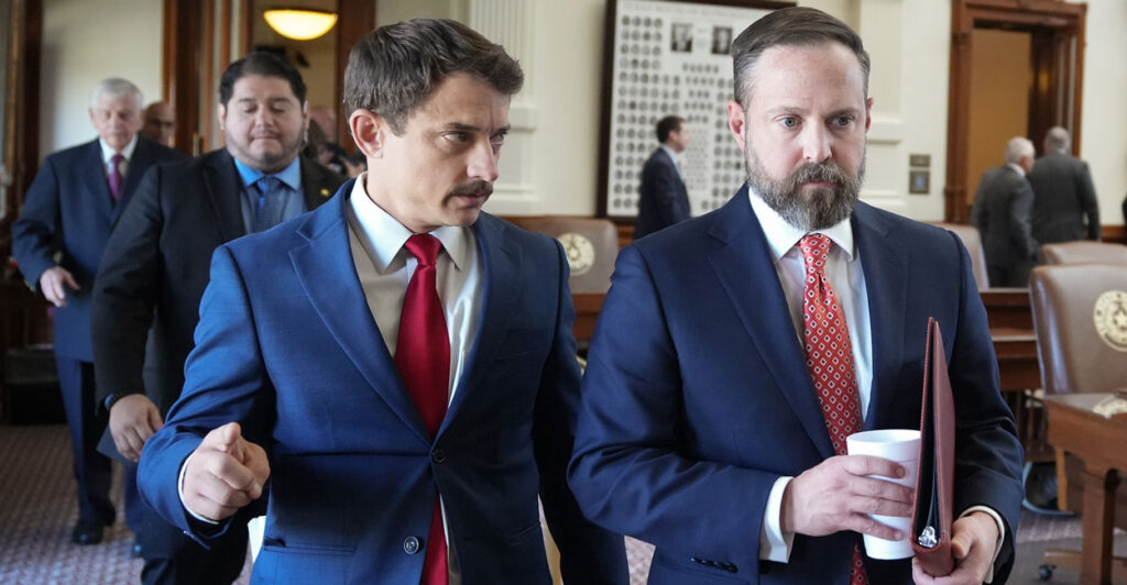 Republican state Rep. Briscoe Cain (left) and Speaker of the House Dustin Burrows leave the Texas House floor after a quorum call failed on Aug. 8.