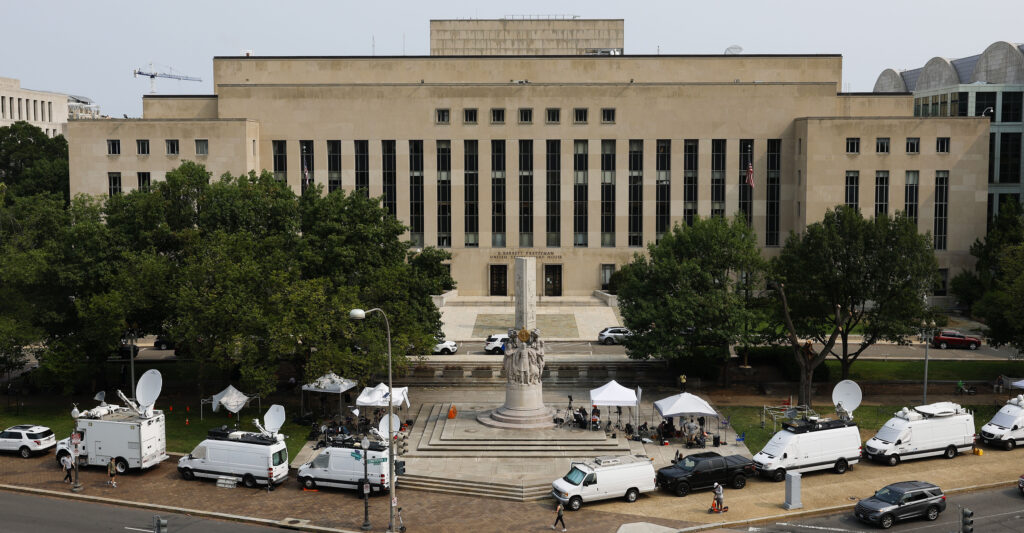 Media tents and television satellite trucks sit parked outside of the E. Barrett Prettyman U.S. District Court House on August 01, 2023 in Washington, DC.