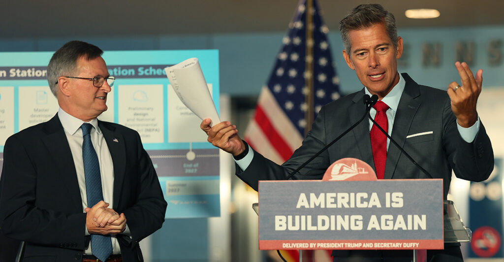 Deputy Transportation Secretary Steve Bradbury (left) and Secretary Sean Duffy hold a press conference at Penn Station in New York City on Wednesday.