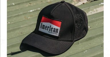 a baseball cap made by Nine Line Apparel sports a red-and-white logo resembling that of Marlboro cigarettes, but with the word "American" on it.