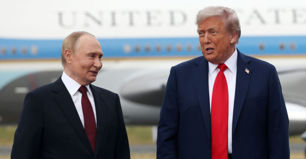 President Donald Trump and Russian President Vladimir Putin chat on the tarmac in front of Air Force One.