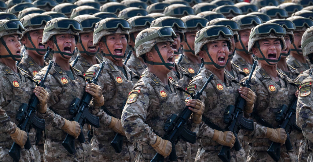 Chinese soldiers march during a military parade in Tiananmen Square in Beijing.