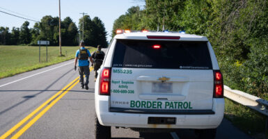 Swanton Sector Border Patrol agents conduct a search near Rouses Point, New York, on Aug. 21.