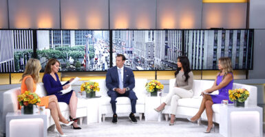 Joey Jones, Kayleigh McEnany, Dagen McDowell, Emily Compagno and Dr. Nicole Saphier are sitting on a white sofa.