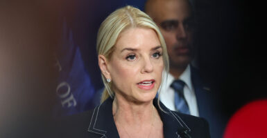 Headshot of Pam Bondi in a dark suit.