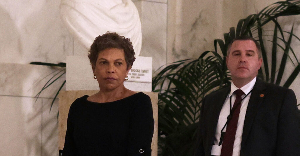 U.S. District Judge Tanya Chutkan (L), pays respect to the late retired Supreme Court Justice Sandra Day O'Connor.